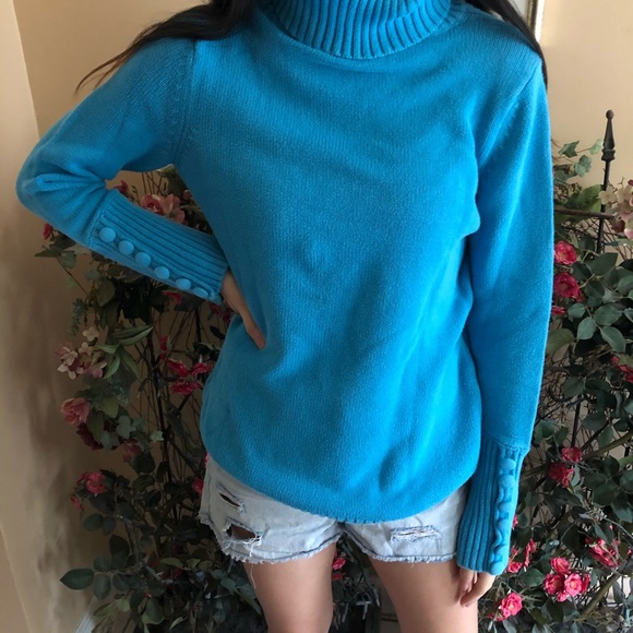bright blue turtleneck